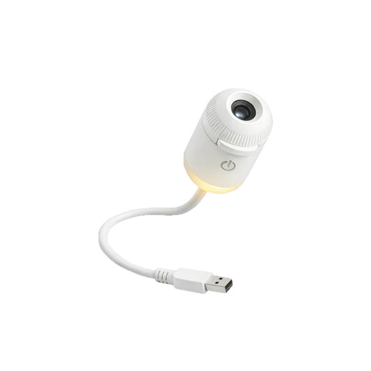 Starry sky projector lamp glowing in dark nursery room